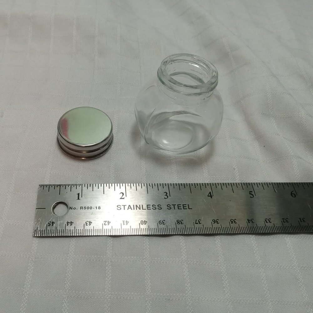 Cute little miniature dispenser jar with cap
